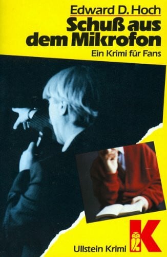 Edward D. Hoch Schuß aus dem Mikrofon.