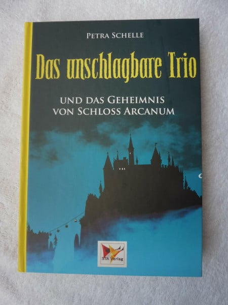 petra schelle das unschlagbare trio - und das geheimnis von schloss arcanum